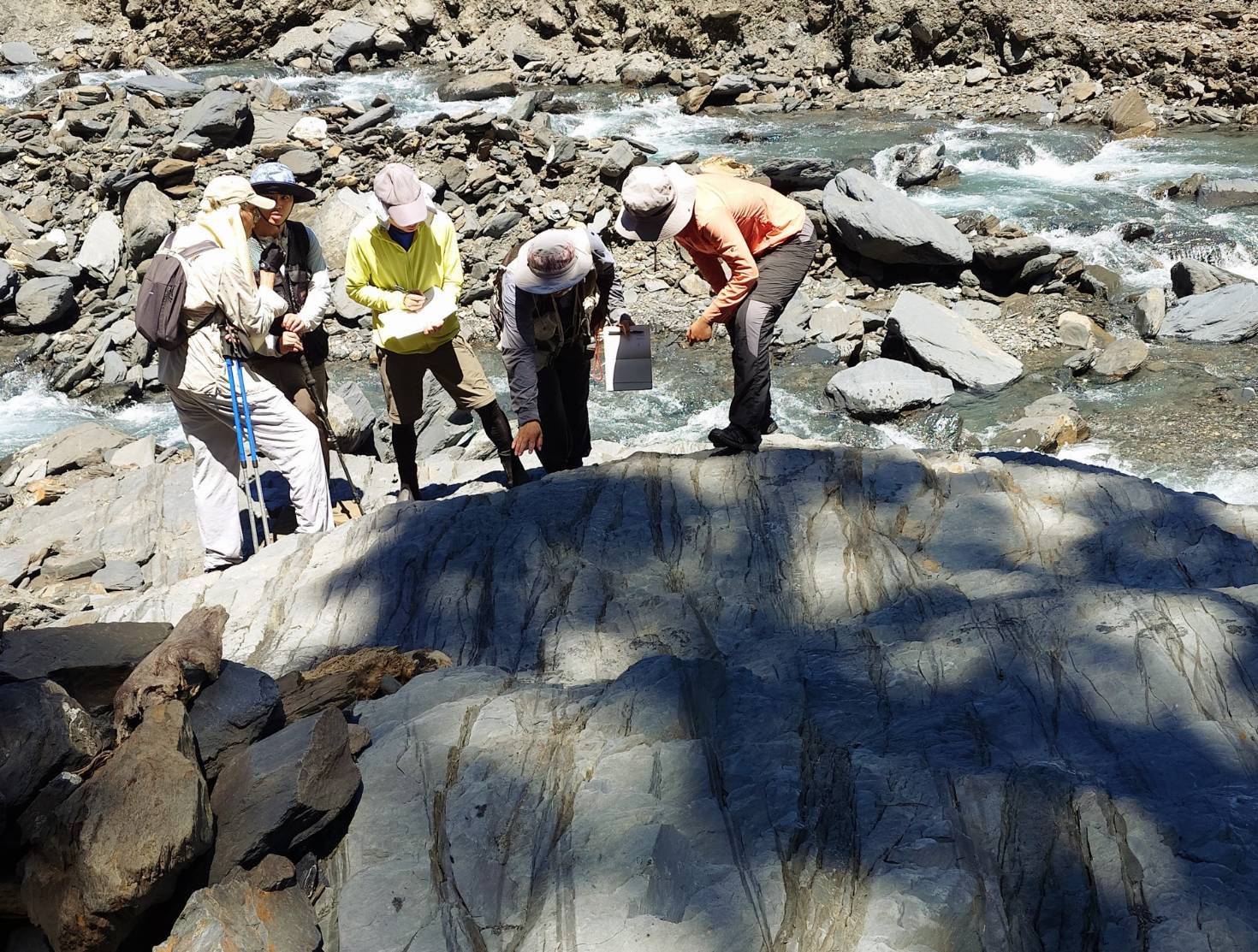 The research team conducted geological surveys to document stratigraphic attitudes, fracture density, and stress orientations. Photo credit: Academia Sinica.
